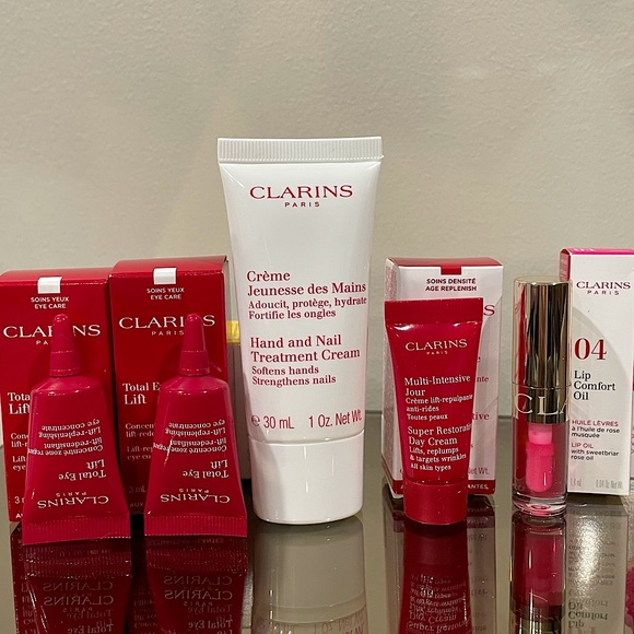 Clarins Other - CLARINS Paris 5pc Bundle Lip Comfort Oil Eye Lift Hand Nail Cream Jour Cream NEW